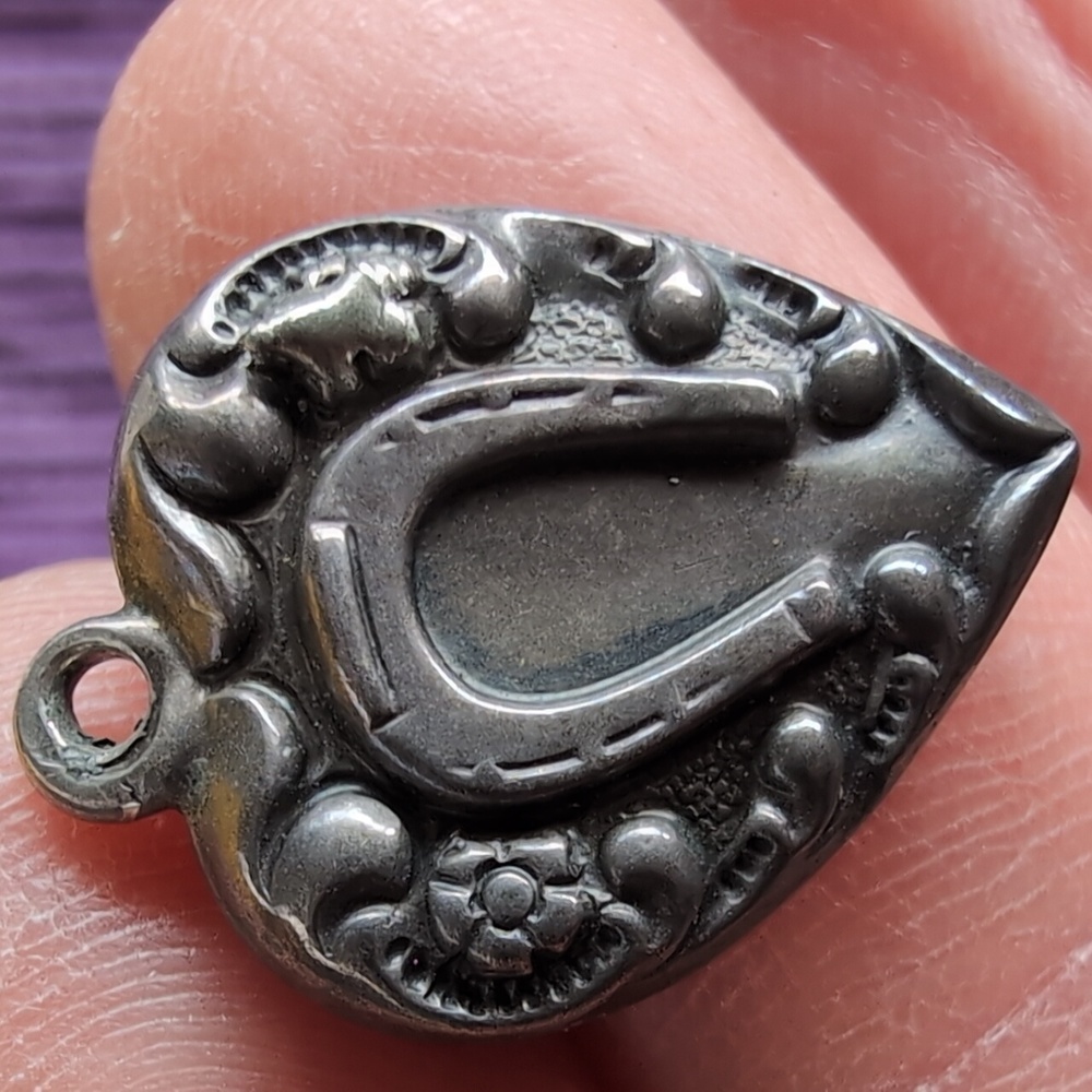 Antique sterling silver puffed heart charm